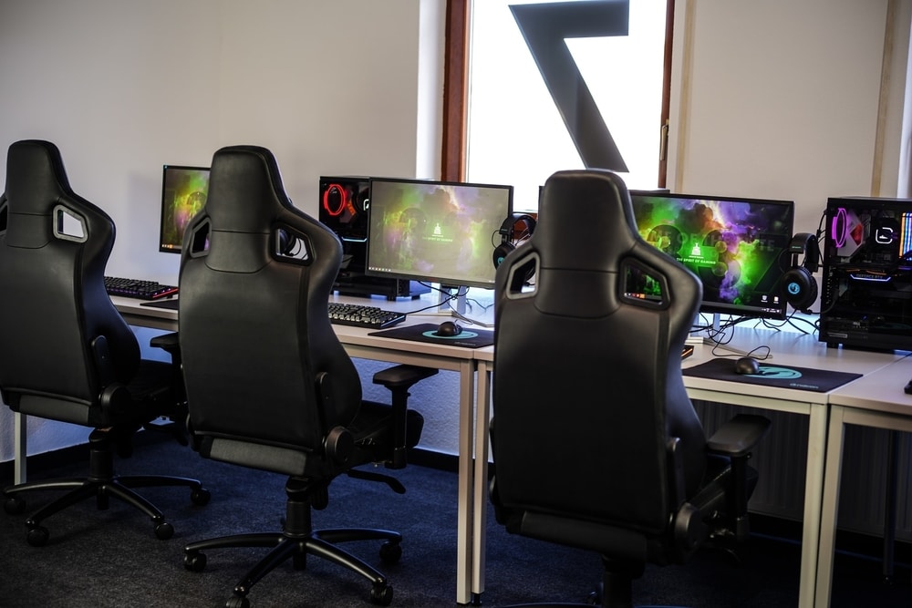 Gaming chairs and desktops together